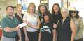 (Principal Rob Mazzoli is pictured accepting the check from Sharon McAllister, Art Fest Director and Jeanne Seehaver, Assistant Festival Director. Also pictured are Matlacha Hookers Deb Cundall who is the Matlacha Hooker 2011 Event Chair, Marie Rando, Katie Fischer who will be Art Fest 2012 Chair, Matlacha Hooker President  Arlene Stornello, and Toni Logan.
 